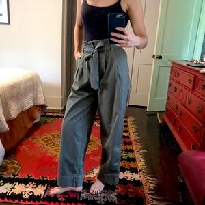 Everlane olive green paper bag pants. Elastic, high waist. Tie belt.